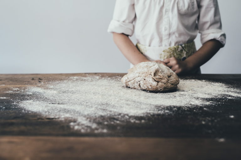 Baker kneading dough